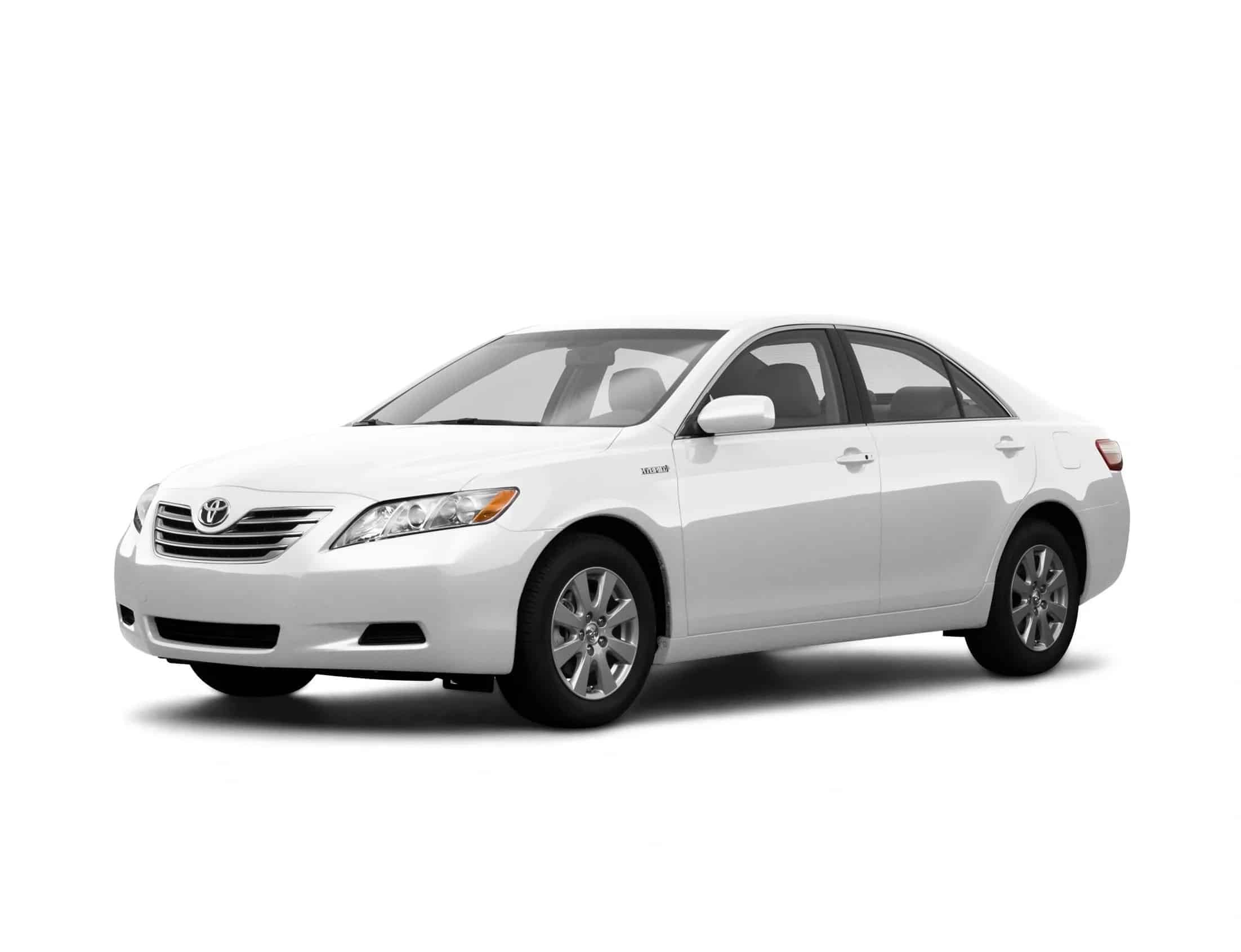 Side profile of a white toyota car with a white background